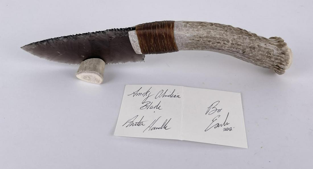 Bo Earls Handmade Obsidian Horn Handle Knife: Handmade by Bo Earls. Bo is one of the finest modern flint and obsidian knappers. His knives are some of the nicest money can buy. The handle is whitetail deer horn. 8" long including handle.
