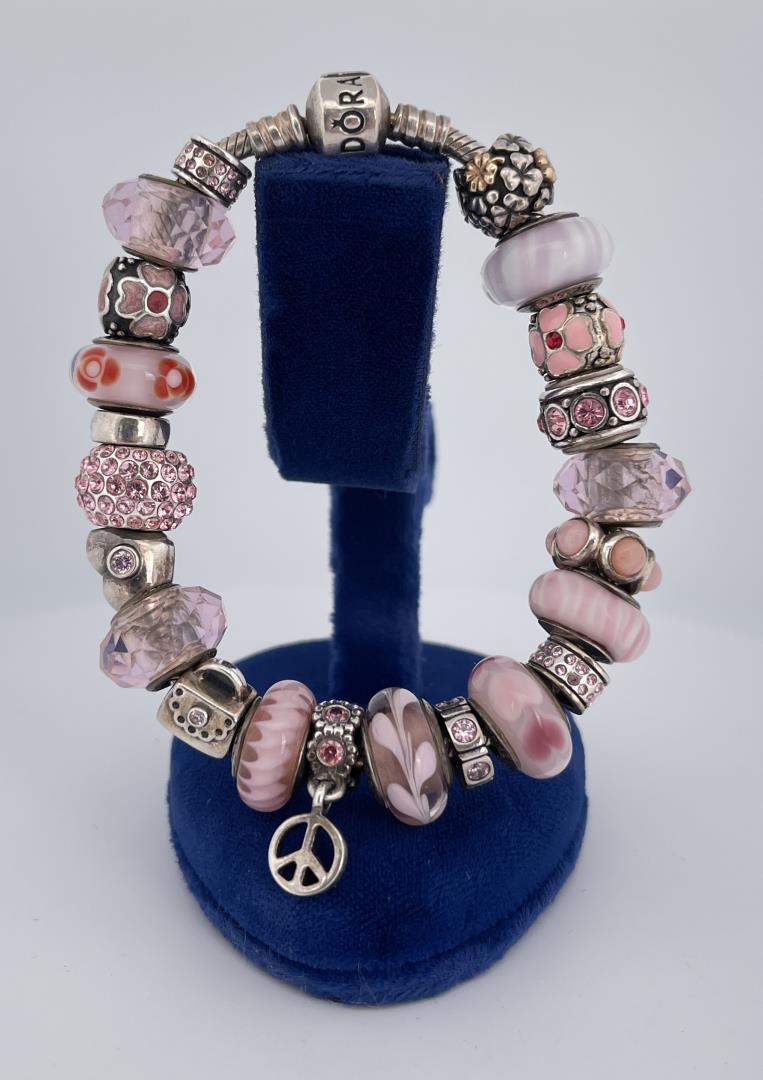 Pandora Sterling Silver Charm Bracelet: Very nice bracelet. 22 total charms.