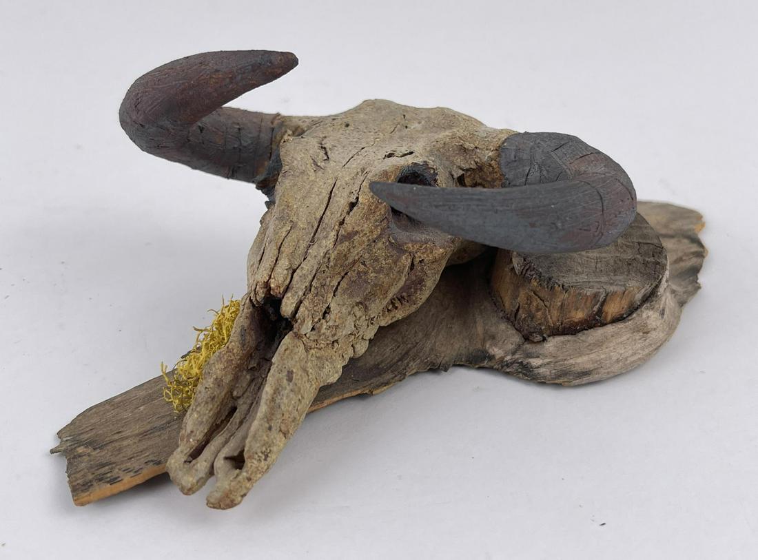 Clay Buffalo Skull Sculpture Beasley: Signed Beasley as shown. Mounted on wood.