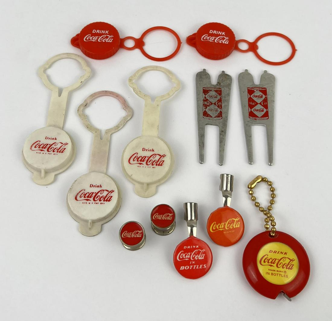 Group of Coca Cola Premiums: Nice grouping. Pen toppers, tape measure, bottle caps, and golf ball repair tools.