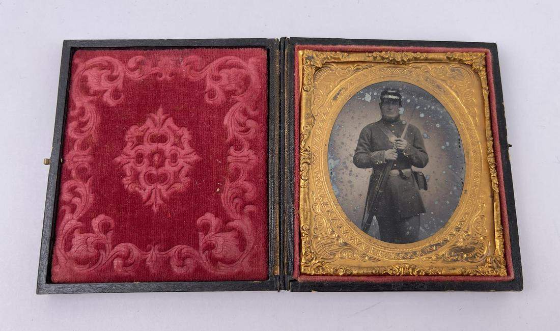 Civil War Union Soldier Ambrotype Photo: Nice image of man holding rifle with bayonet attached.