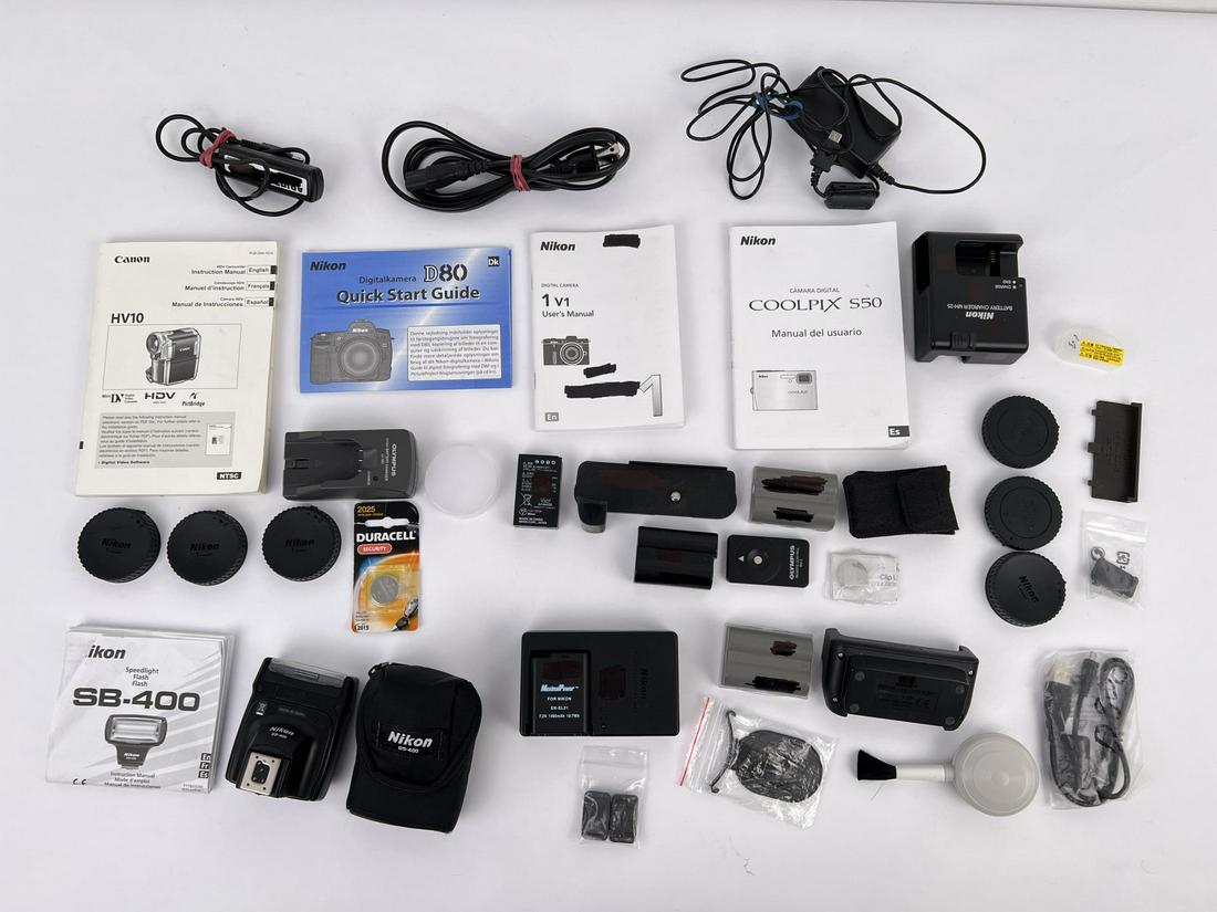 Large group of Nikon Camera Accessories: Nice grouping.