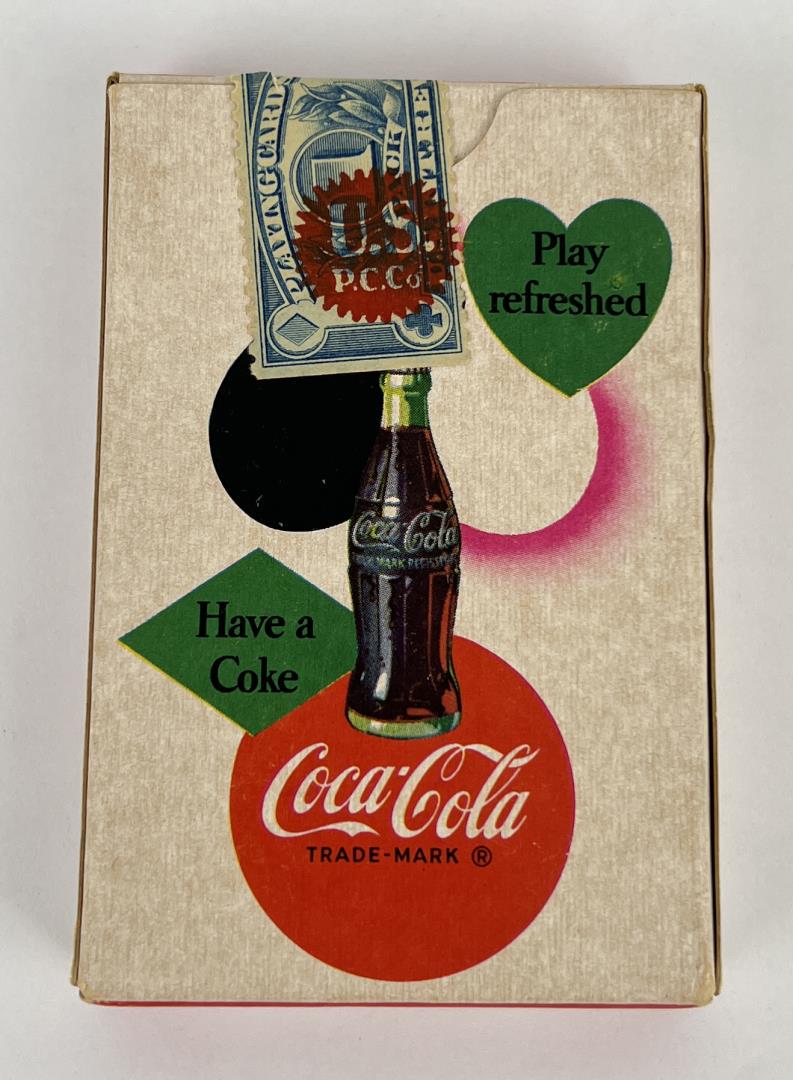 Vintage 1951 Coca-Cola Cowgirl Playing Cards: Factory sealed with tax stamp. 1951 deck of Coca-Cola playing cards featuring a "Cowgirl" theme. The deck being offered here is mint sealed in the original box, as issued. This deck was not issued wit