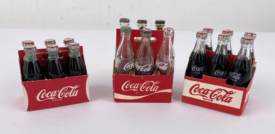 Group of Miniature Coca Cola Bottles: Nice grouping of Mini 6 Bottle Carriers.