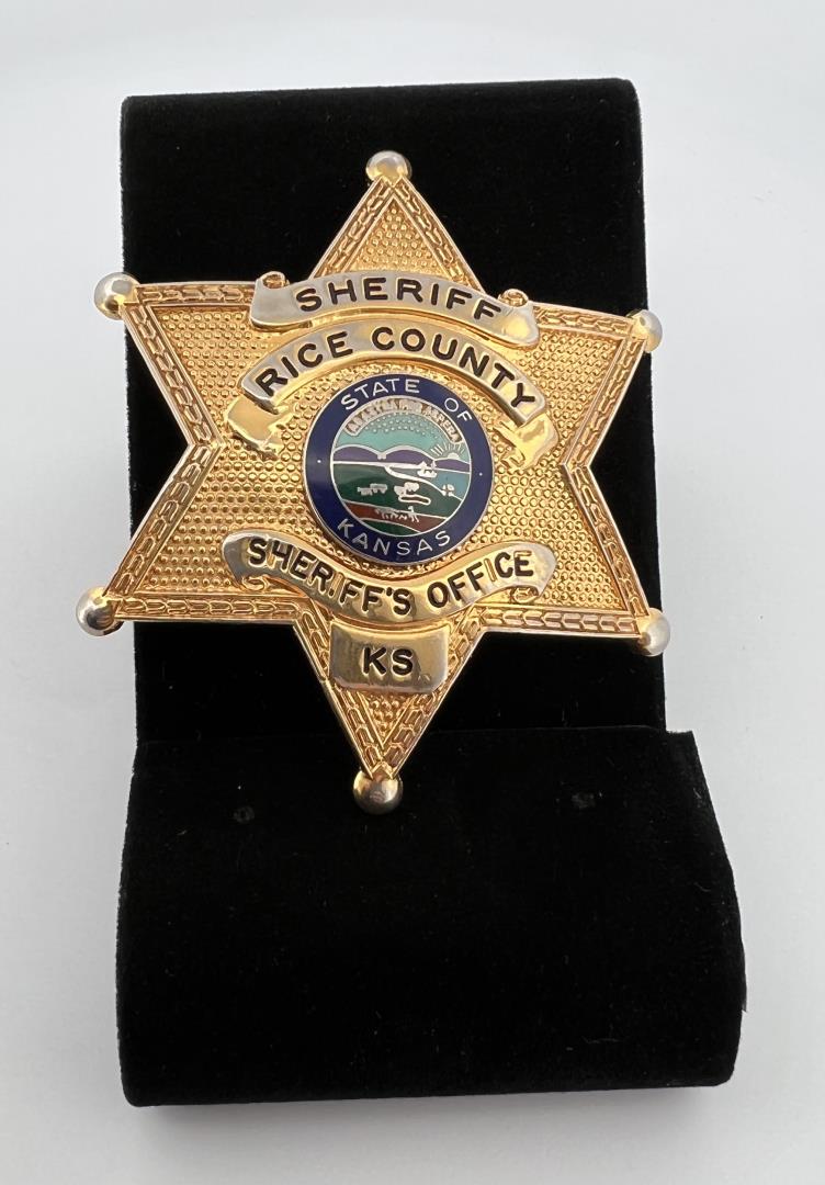 Sheriff Rice County Kansas Badge: 2 1/2" diameter. Provenance: Jack Ooley Collection.