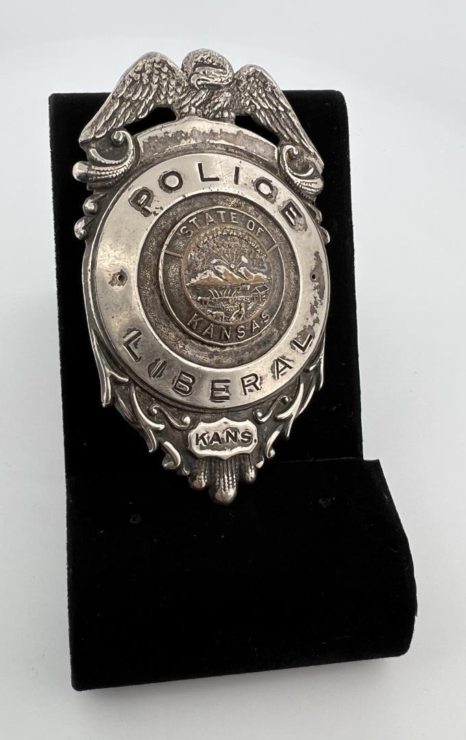 Police Liberal Kansas Badge: 3" long. Provenance: Jack Ooley Collection.
