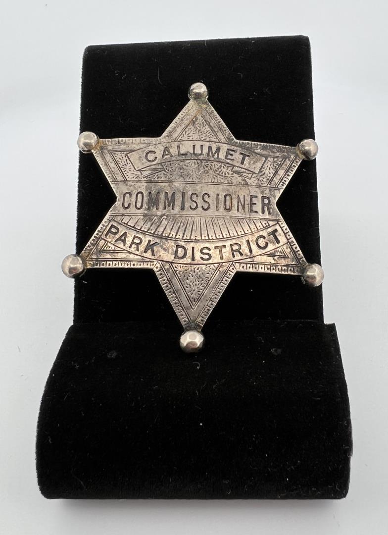 Calumet Park District Chicago Commissioner Badge: Most likely Fire Commissioner. Chicago Illinois. 2 3/8" diameter. Provenance: Jack Ooley Collection.