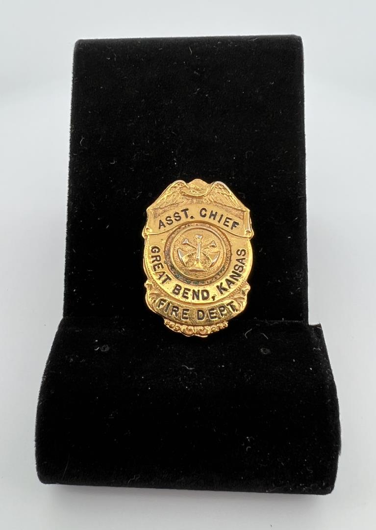 Great Bend Kansas Fire Department Badge: 1 1/4" long. Provenance: Jack Ooley Collection.
