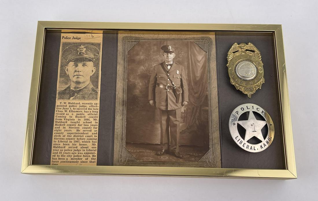 Liberal Kansas Police Badges Named: Named to a TW Hubbard of Liberal Kansas. Also included is his photo as shown. Wonderful set of badges. 7 1/4" by 12" framed. Provenance: Jack Ooley Collection.