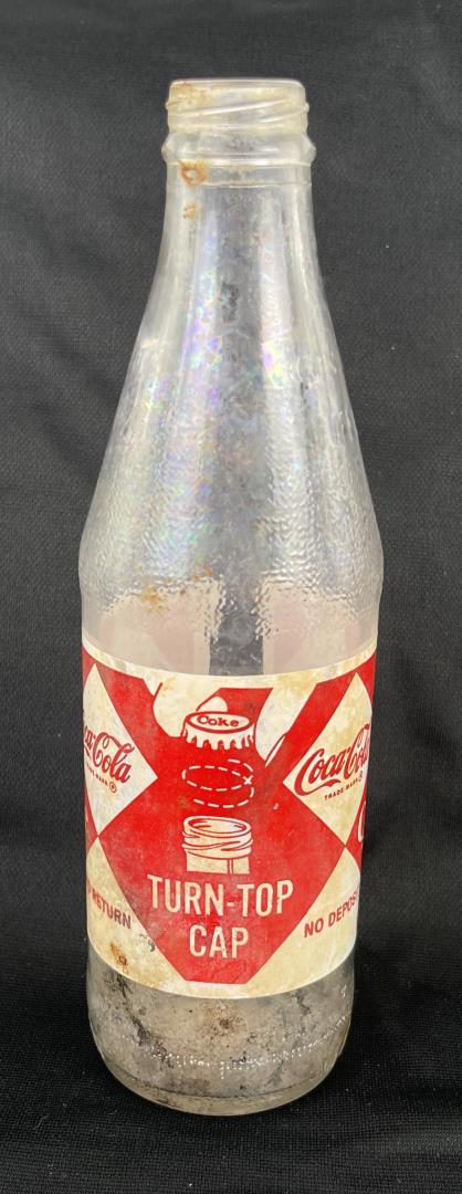Coca Cola Turn Top ACL Bottle: Has sickness as shown.