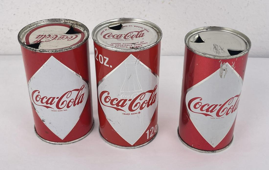 Vintage Coca Cola Soda Cans: Nice grouping.