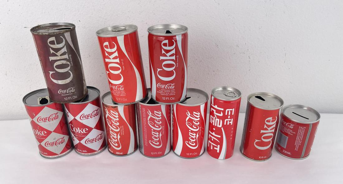 Vintage Coca Cola Soda Cans: Nice grouping.