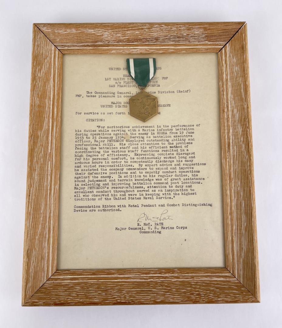 Korean War 1st Marine Division Medal: Named with document.