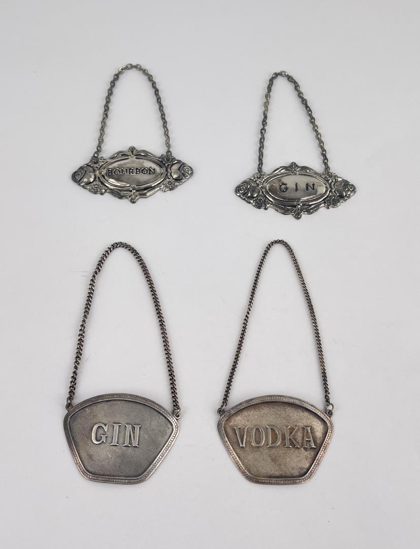 Sterling Silver Bottle Liquor Bottle Tags: Nice grouping.