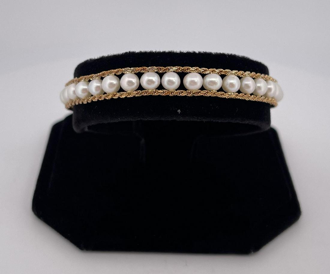 14k Gold and Pearl Tennis Bracelet: 8.63 grams total weight.