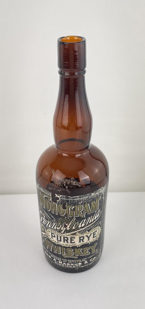 Monogram Pennsylvania Whiskey Bottle: Magnus and Co Cincinnati Ohio.