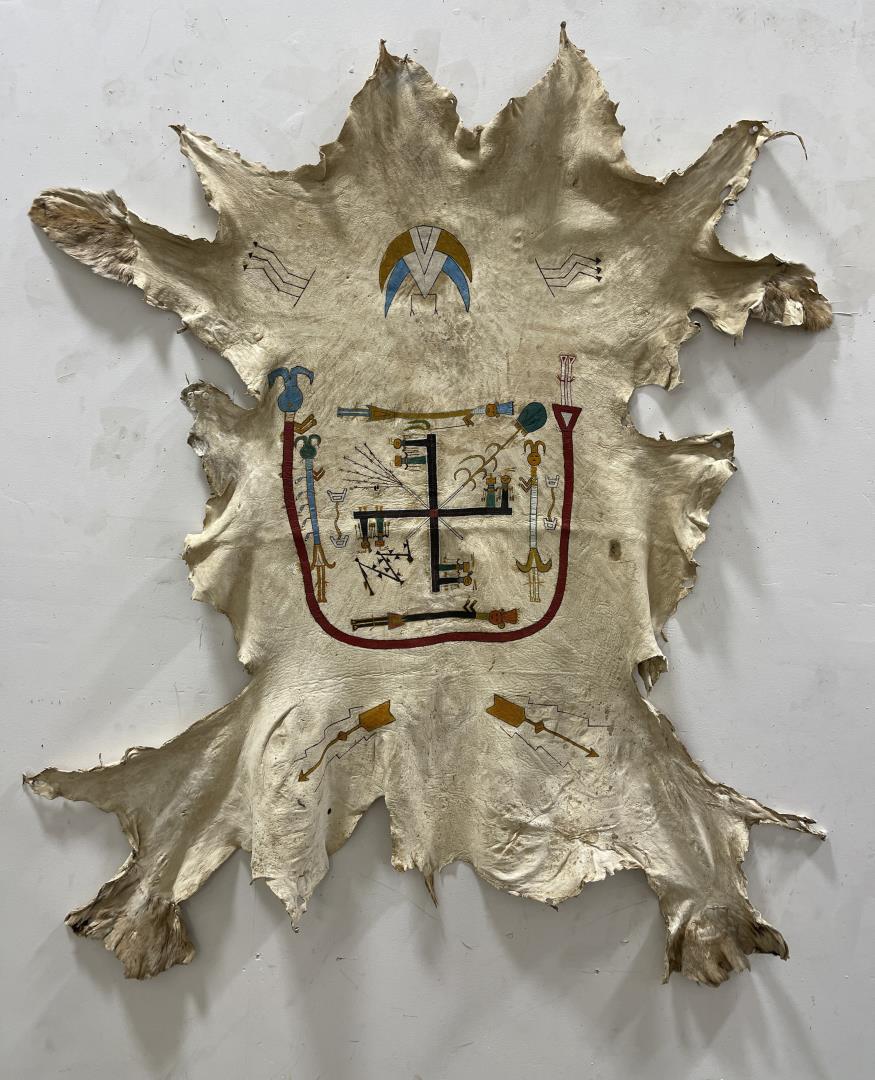 Antique Navajo Nightway Chant Painted Deerskin: Sand-painting example in the Whirling Log design most likely painted by Hastiin Klah or Gladys Manuelito, circa 1920-1930. 45" by 55".