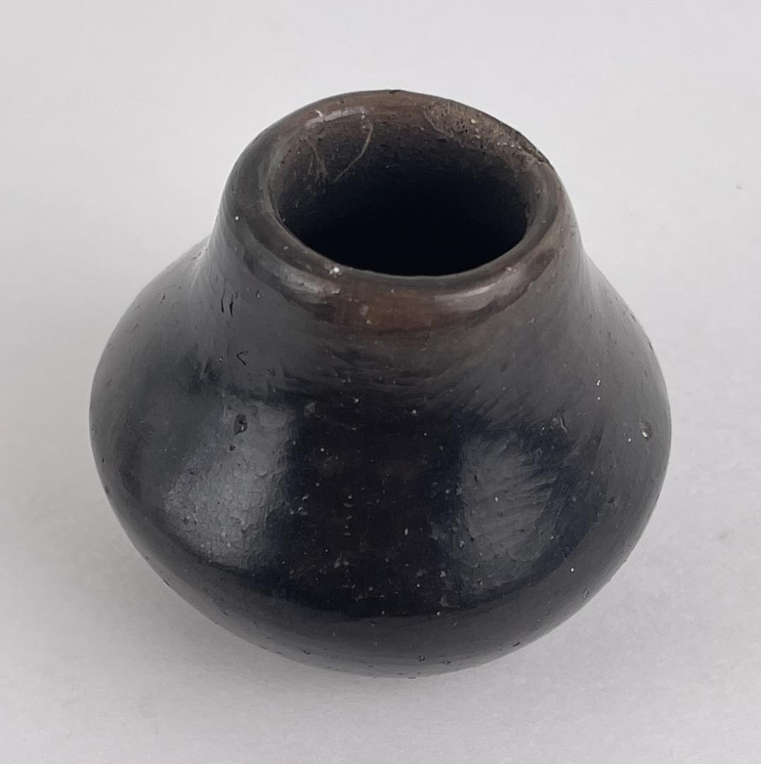 San Ildefonso Pueblo Indian Pot: Appears to be signed Maria, but is extremely faint. Chipped. 1 7/8" tall, 2 1/8" diameter. Allard Auction Collection Inv: MCL