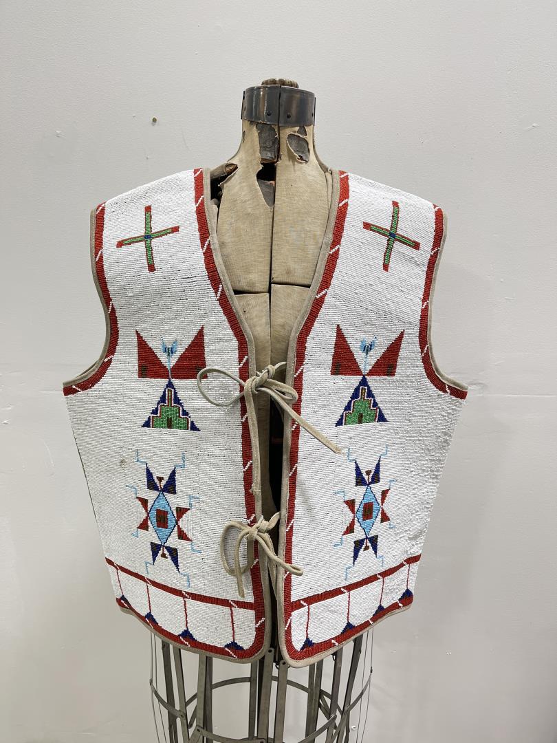 Montana Rendezvous Indian Style Beaded Vest: Very nicely made modern beaded vest. Would work great if you are attending a rendezvous, for cosplay, or for movie use. 26" chest, 27 1/2" tall.