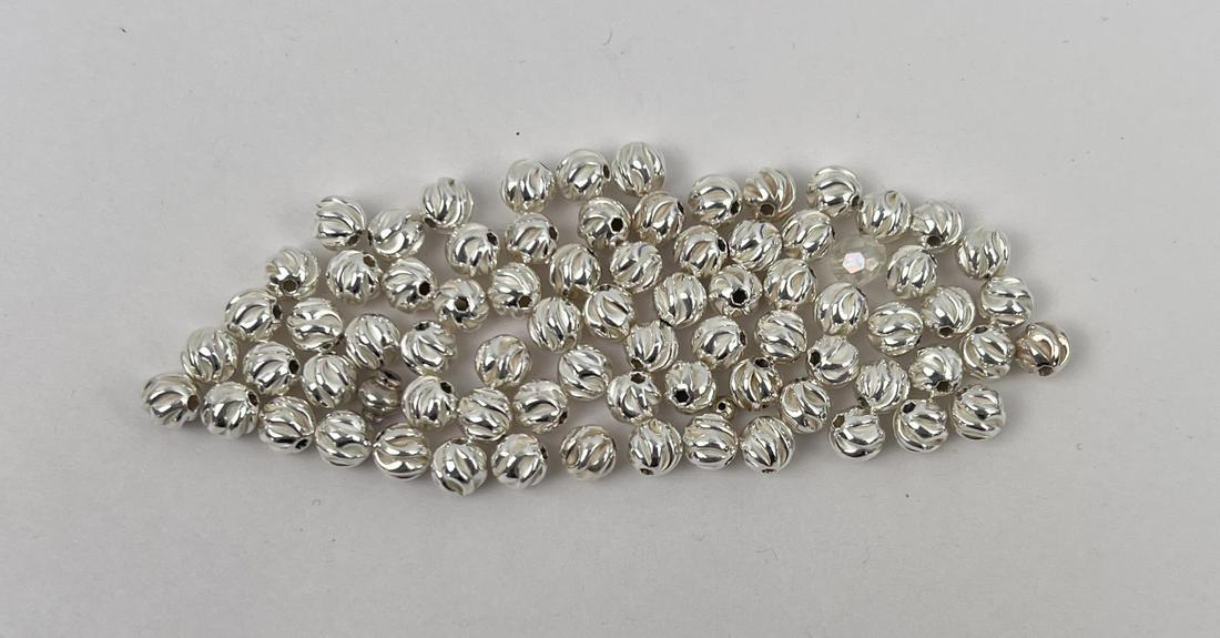Sterling Silver Bench Beads: 43 Grams total weight not including the one glass bead as shown.
