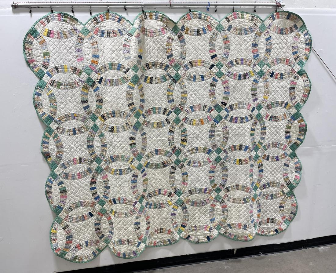 Antique Hand Sewn Wedding Ring Quilt: 75" by 94".