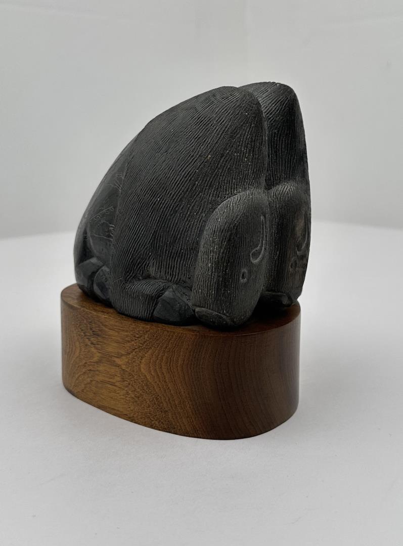 David Paul Bradley Buffalo Limestone Sculpture: 5 1/2" by 4 3/4" by 3 5/8". David Paul Bradley (Born 1954) is active/lives in New Mexico, Minnesota. David Bradley is known for Modernist naive Indian genre painting, sculpture, ceramics, prints. Born