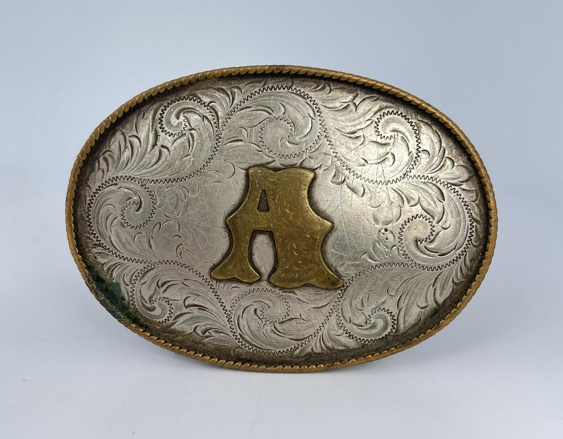 Montana Silversmiths Cowboy Belt Buckle: 3 1/2" long.