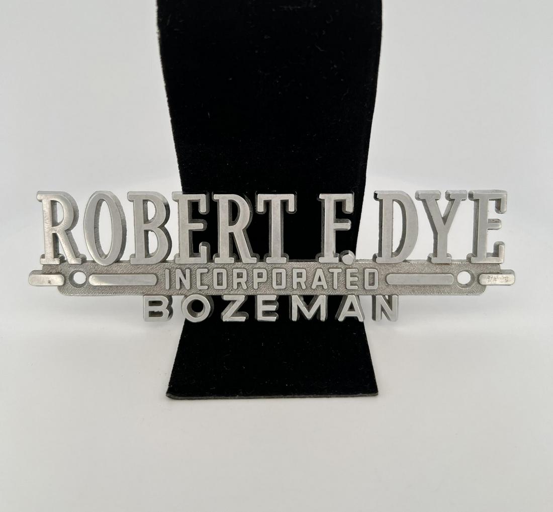 Robert Dye Bozeman Montana Car Dealer Plaque: 5 5/8" long, 1 1/2" tall.