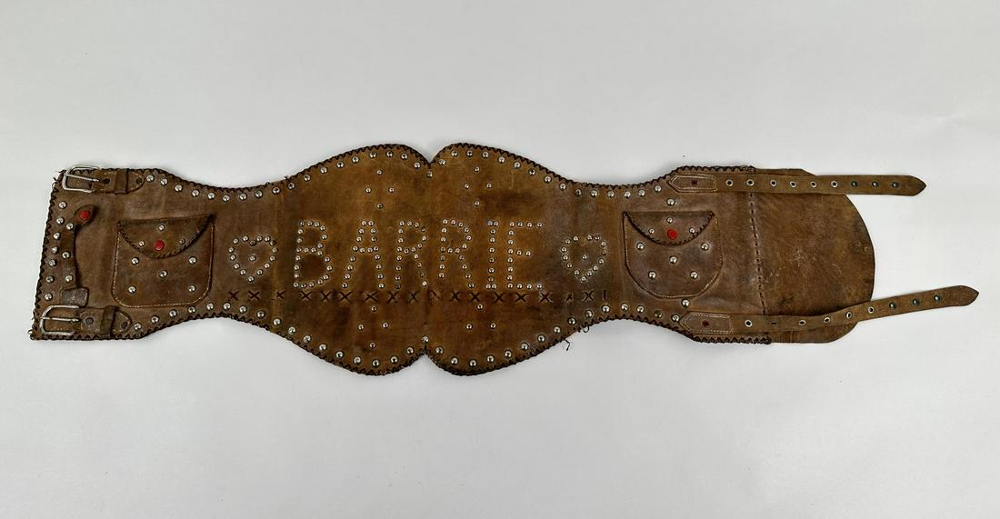 Phenomenal 1940s Studded Motorcycle Belt: Wonderful old kidney belt. Barrie with Hearts and Double Stash Pockets. A true work of American Folk Art. 43" long overall.