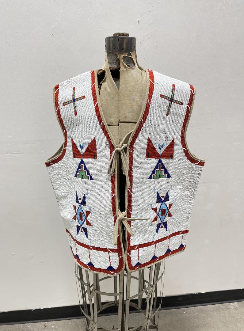 Montana Rendezvous Indian Style Beaded Vest: Very nicely made modern beaded vest. Would work great if you are attending a rendezvous, for cosplay, or for movie use. 24 1/2" chest, 27" long.