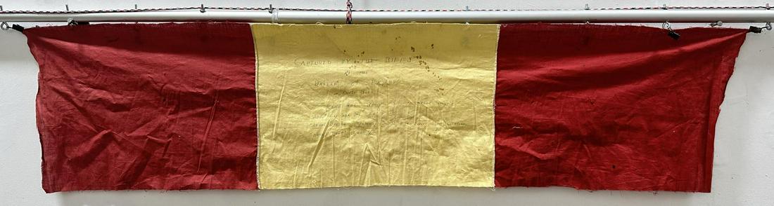 Spanish American War Battle Captured Flag: Captured by the Riffs at the Battle of Fajardo Porto Rico. Soldiers are identified as shown. Flag is blood spattered. 12" by 51". A true piece of American History.