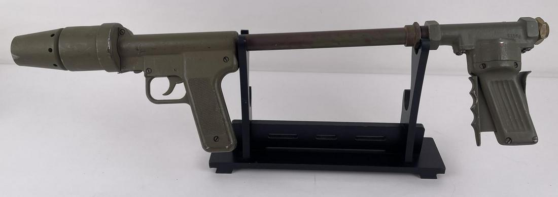 Korean War M2A1 US Army Flamethrower Wand: The M2A1-2 is the variation of the M2 devised during the Korean War. These had straight sided backpack frames, vented gas caps, a cylinder sized regulator and a safety valve.