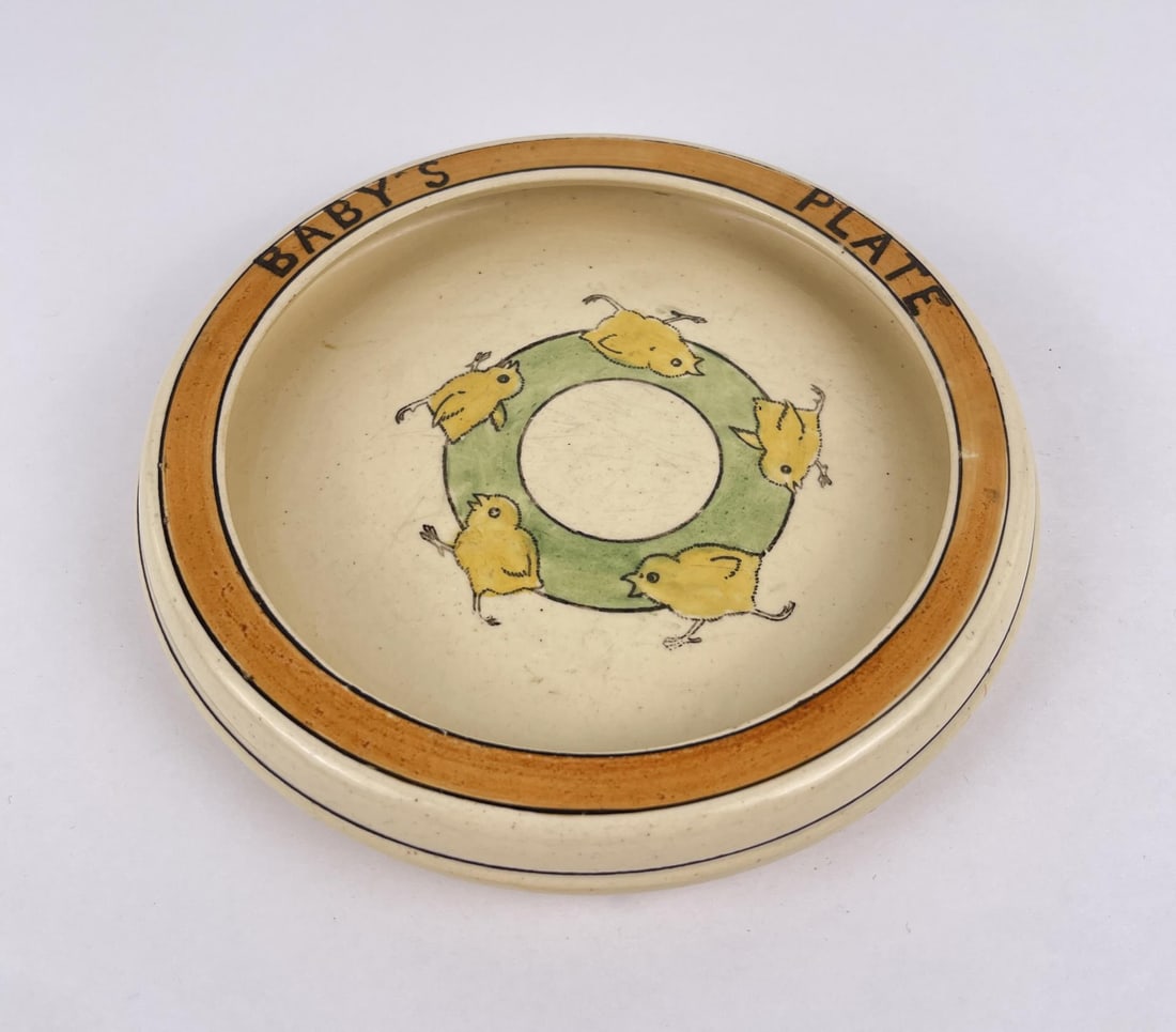 Roseville Juvenile Pottery Baby Plate: 7 5/8" in diameter, 1 1/4" tall.