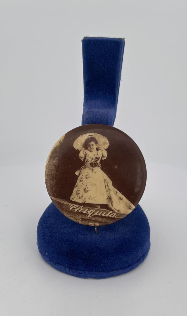 Chiquita the Doll Lady Celluloid Button: 1 5/8" in diameter.