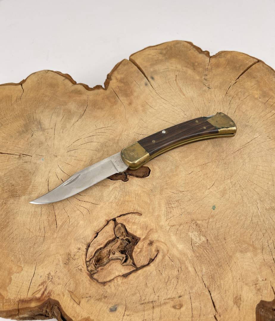 Buck 110 Folding Pocket Knife Auction