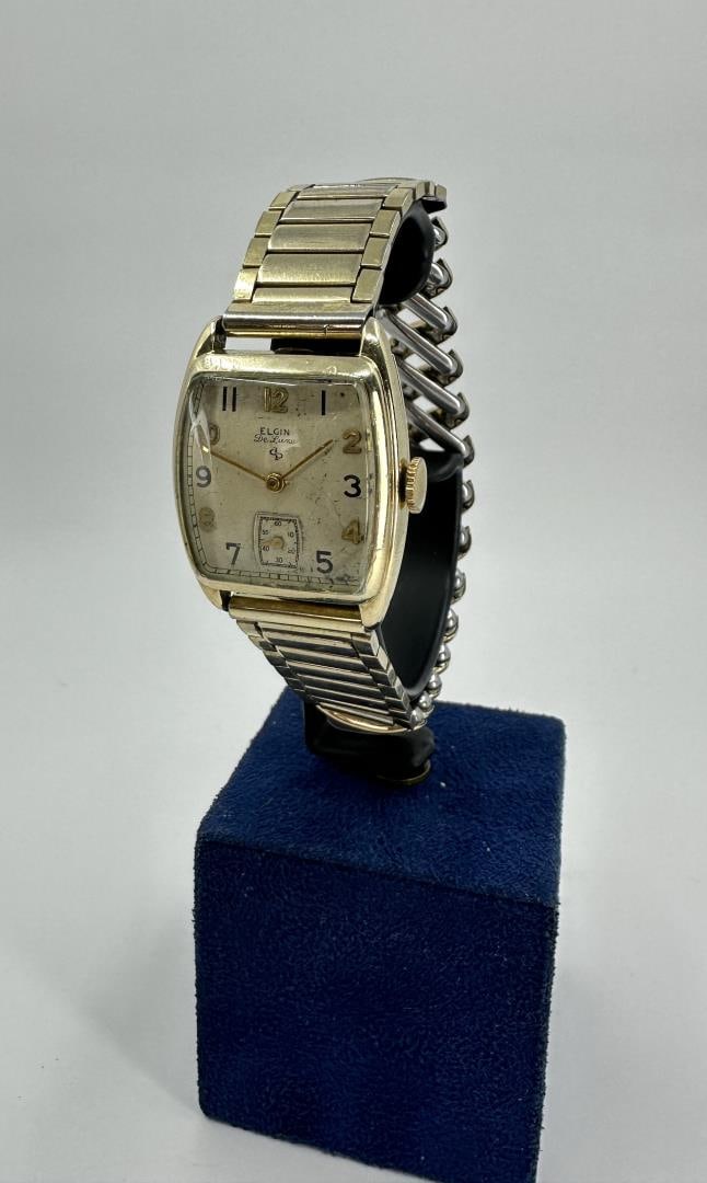 Elgin De Luxe 555 Watch: Recently serviced, however it runs and then stops.