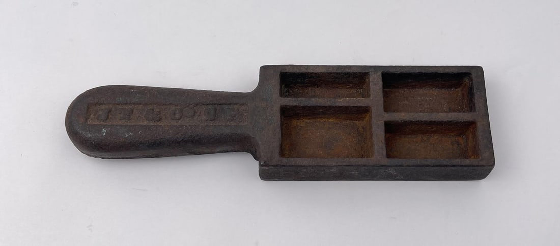 John Taylor & Co. San Francisco Bullion Ingot Mold: It is more specifically referred to in the John Taylor and Co. illustrated catalogue and price list of 1899 as a 'Quadruple, for sample bars'. It is item #1683 on page 66 of the 1899 catalogue. Each o