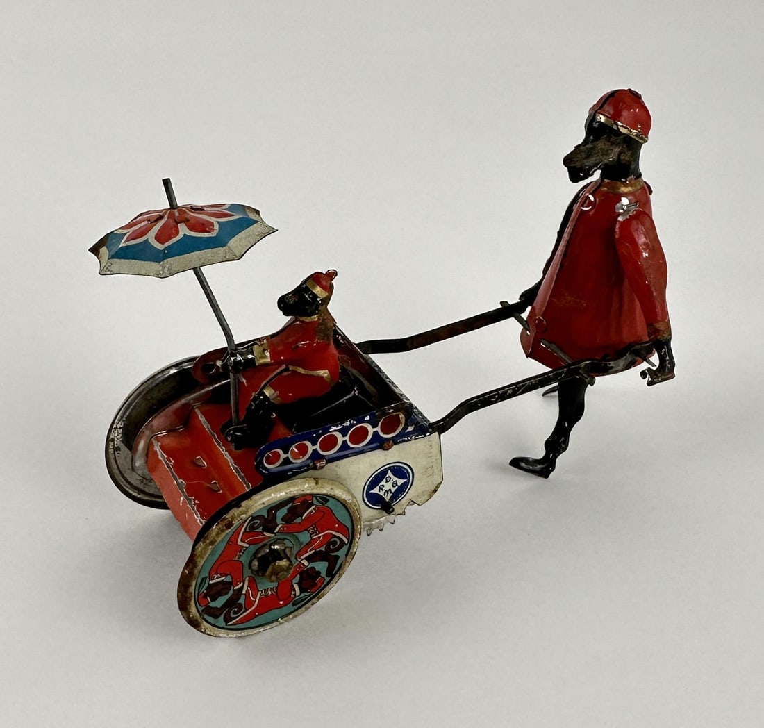 Stock Germany Dog and Monkey Rickshaw Toy: 5 3/4" long.