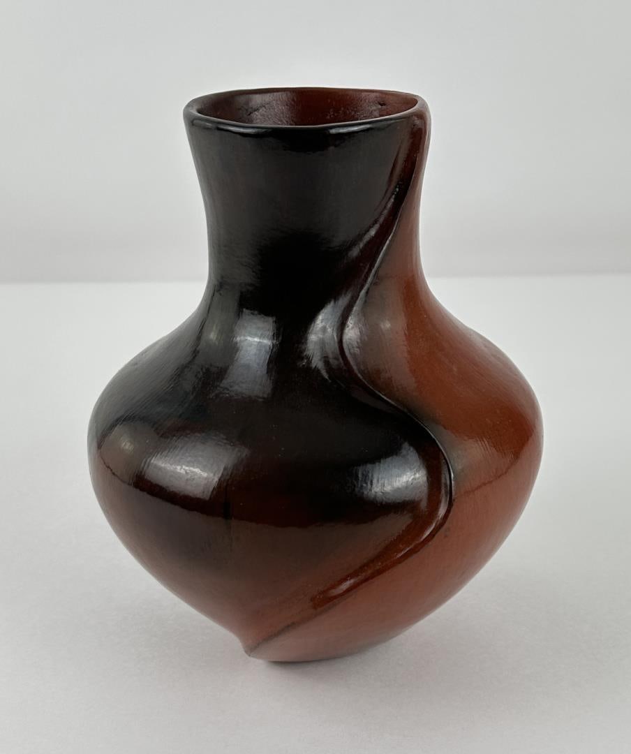 Navajo Indian Pot M. Johnson J. Begay: 7 1/4" tall. 5 3/4" in diameter.