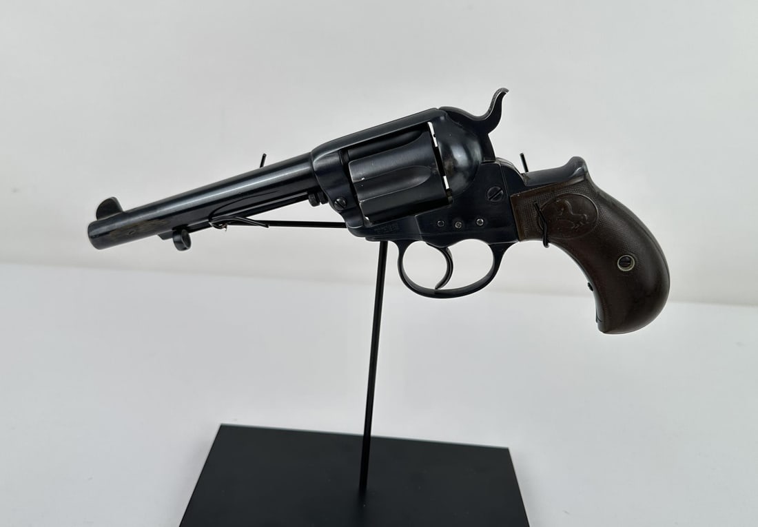 Colt Model 1877 Lightning Revolver: Made in 1881. 5" barrel. Gun functions but cylinder slips when hammer is not cocked. Antique does not require FFL Transfer. Black powder guns cannot be shipped to addresses in Hawaii, Illinois, Michig