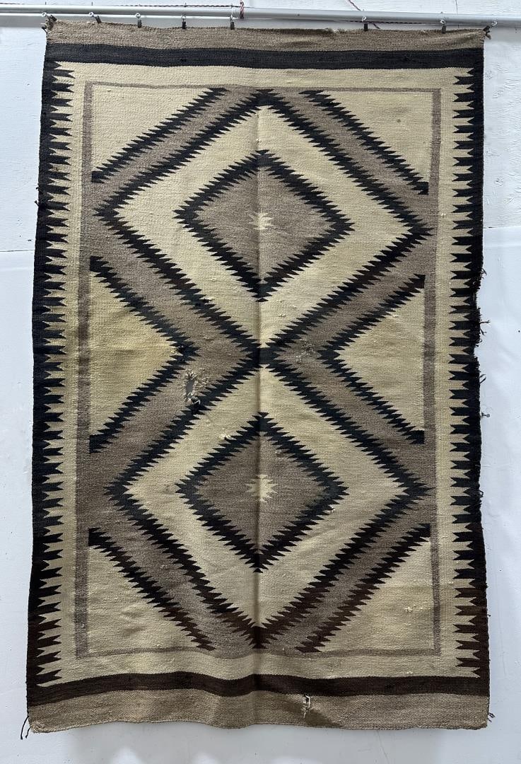 Navajo Indian Eye Dazzler Blanket Rug: 47" by 72". A few holes and areas of wear.