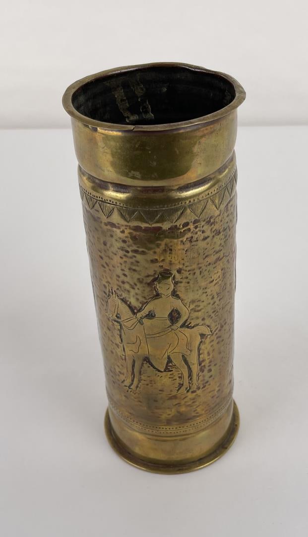 WW1 WWI Prussian German 77mm Trench Art Shell Case: Nice shell. 8.85" tall. Features one man facing a woman on horseback, and two women, one is carrying a basket and wearing a big hat. Dated October 1914.