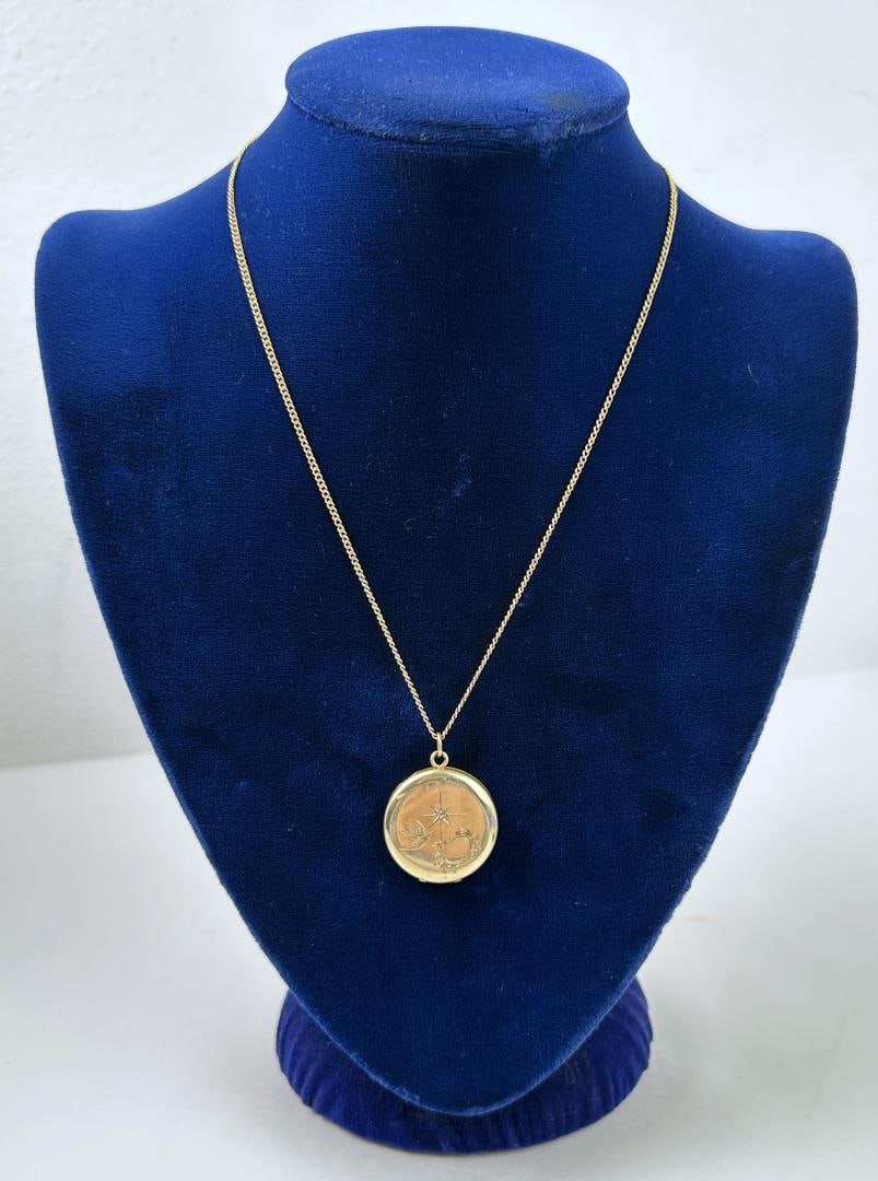 10k Gold and Diamond Victorian Locket: Made by Elgin. 9.96 grams. 10 1/4" long.
