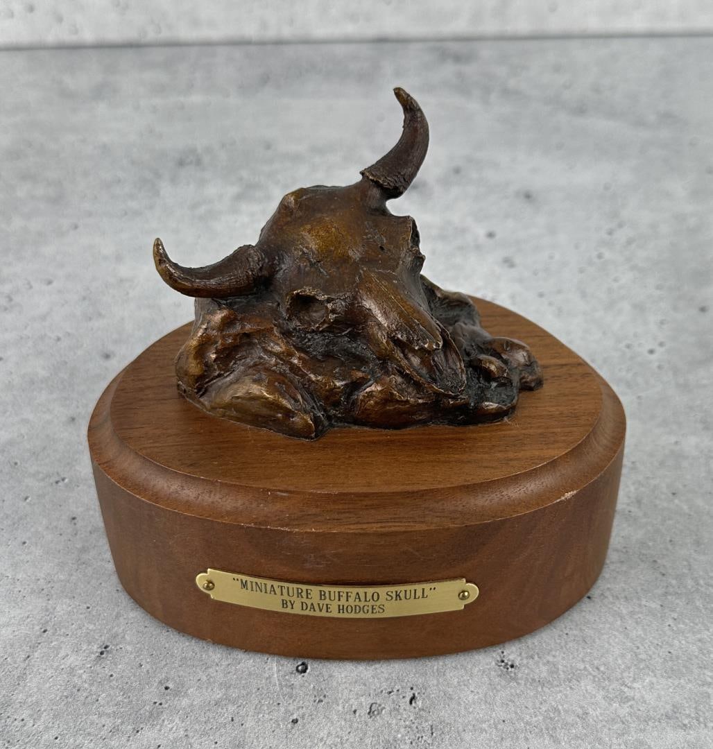 Dave Hodges Buffalo Skull Bronze: 5" tall by 4" diameter. Dave Hodges graduated with a Bachelor of Science degree from Montana State University, Bozeman, Montana in 1979. He began sculpting as a career in 1982 and has been commissione