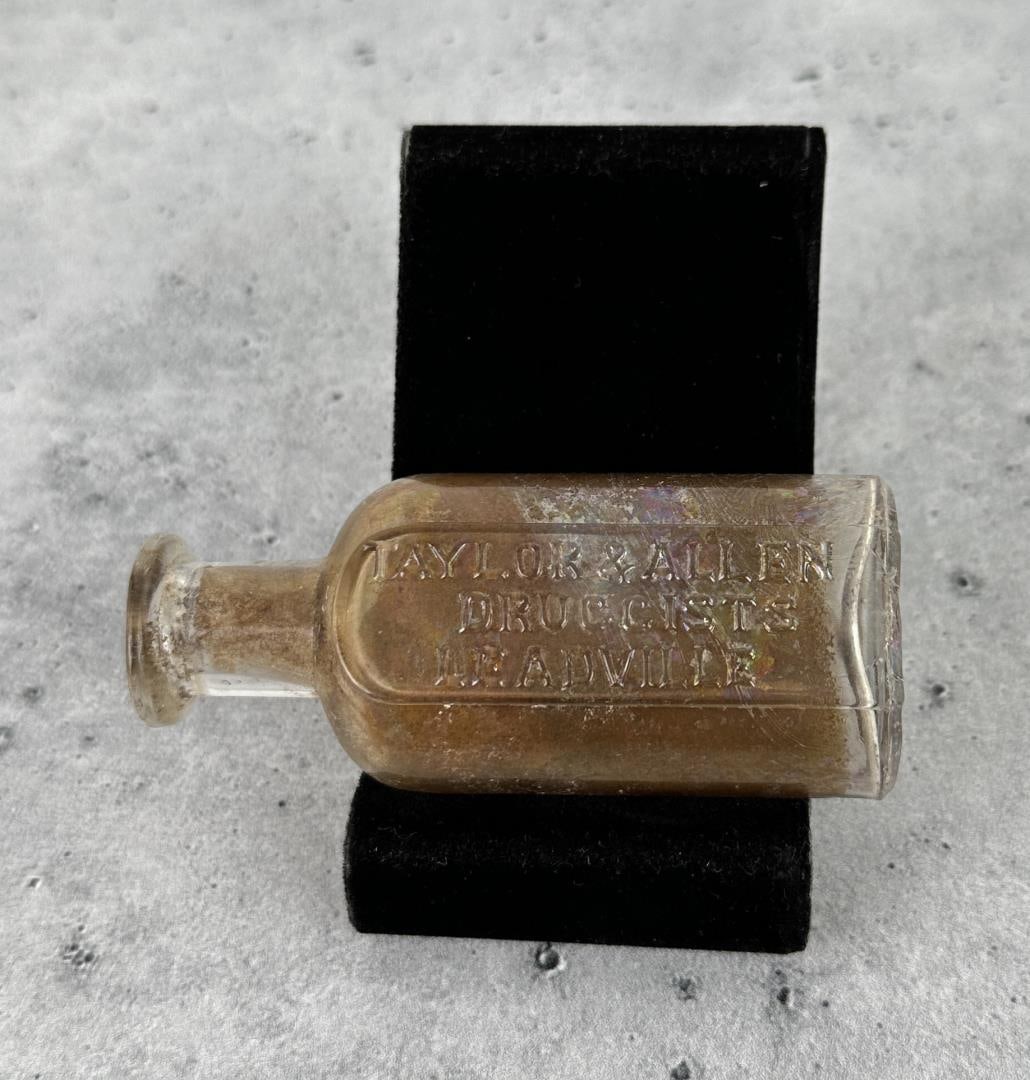 Taylor & Allen Druggists Bottle Leadville Colorado: Dug example