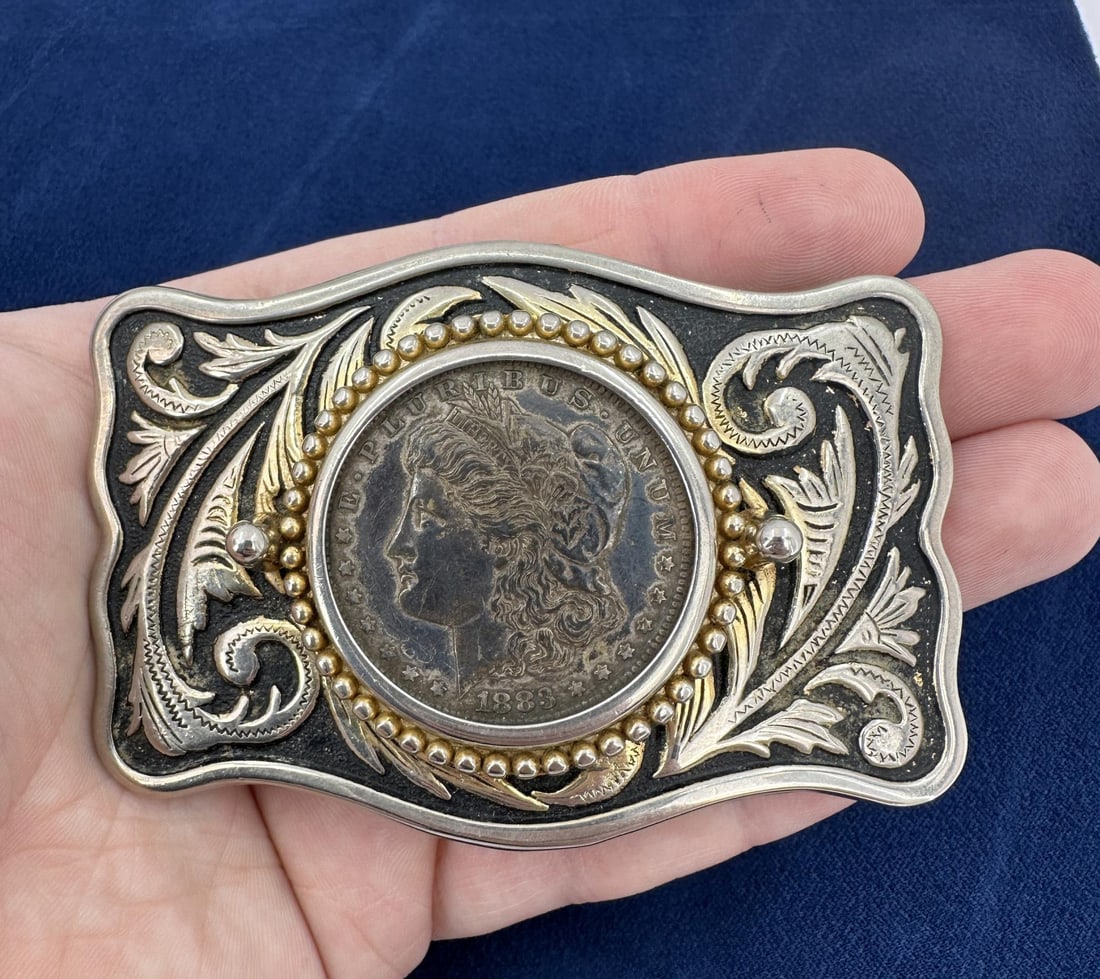 Morgan Silver Dollar Belt Buckle: 3 5/8" long, 2 1/2" wide.