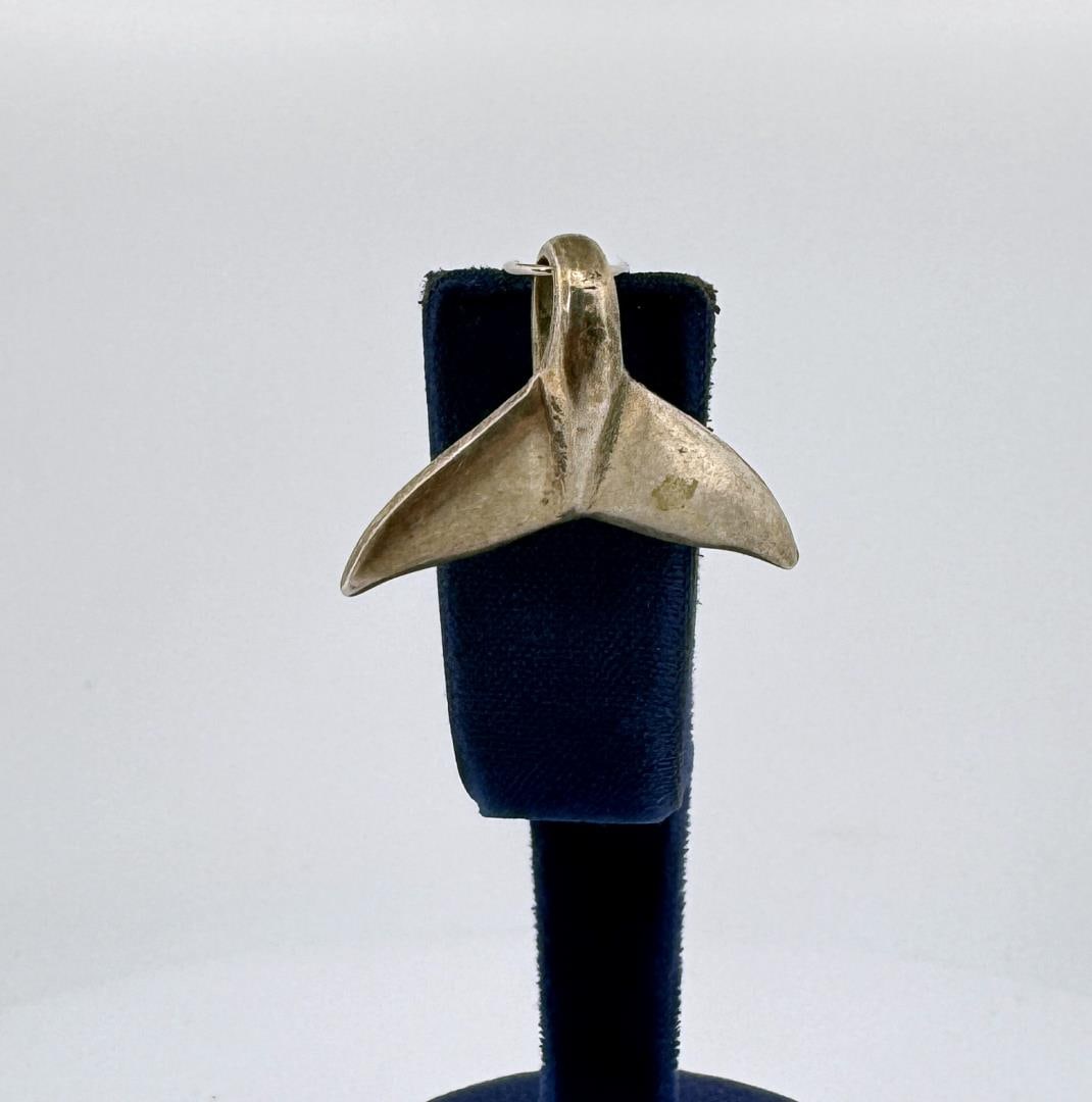 Sterling Silver Whale Tail Pendant: Measures 1" by 3/4".