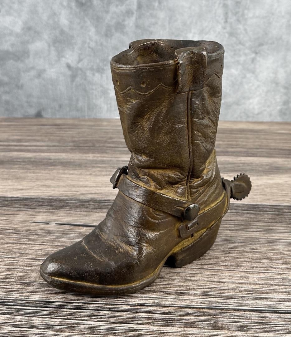 Harry Andrew Jackson Bronze Cowboy Boot: 8" tall, 7 1/4" long, 3" wide. Unsigned Study Piece. Provenance: Harry Andrew Jackson Estate. Harry Andrew Jackson (1924 - 2011) was active/lived in Wyoming, Illinois. Harry Jackson is known for Sculp