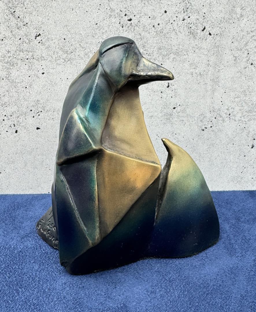 Bob Wilfong Mothers Love Penguin Bronze: 4 1/8" by 3 1/4" by 2 1/4". Title is Mothers Love. Bob Wilfong (late 20th century) was active/lived in Washington. Bob Wilfong is known for Abstract figure sculpture. Bob Wilfong began his sculpting c