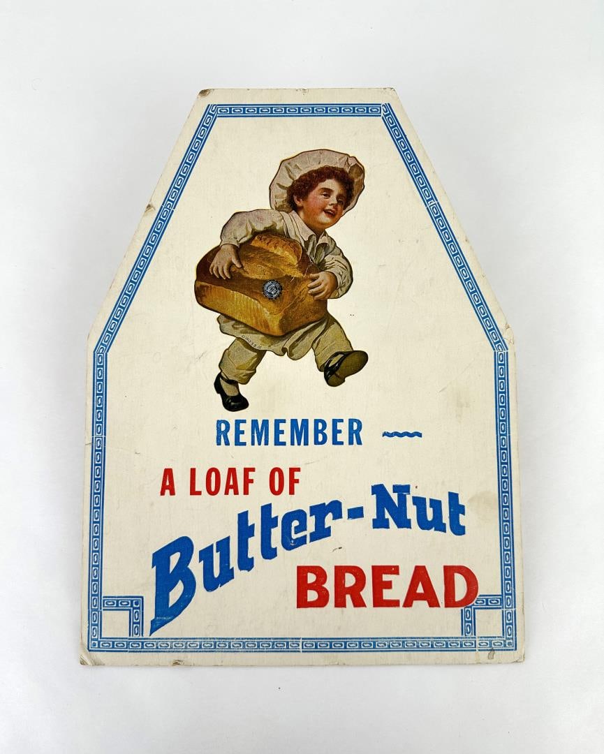 Antique Butter Nut Bread Cardboard Sign: Measures 14" tall by 10 1/2" wide.